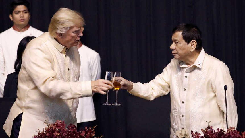 US President Donald Trump toasts with Philippines President Rodrigo Duterte