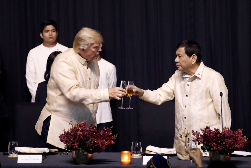 US President Donald Trump toasts with Philippines President Rodrigo Duterte