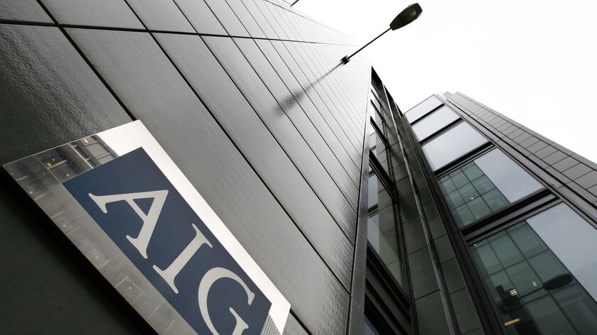 An AIG sign sits on the exterior of an American International Group (AIG) office