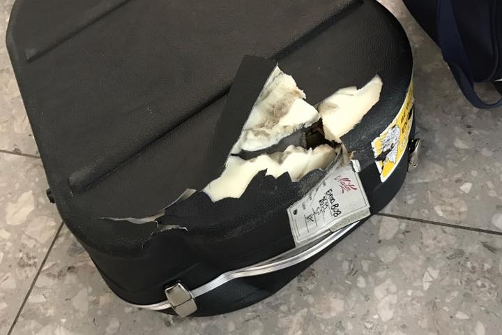 a damaged hard cover instrument road case