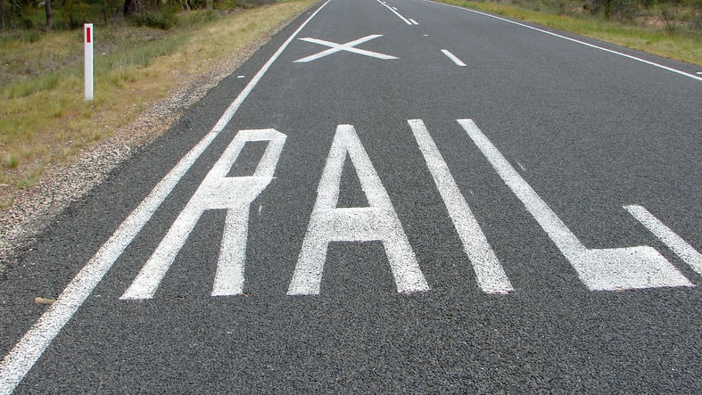 TasRail says initially up to 100,000 thousand tonnes of logs will be taken off the state's roads onto rail.