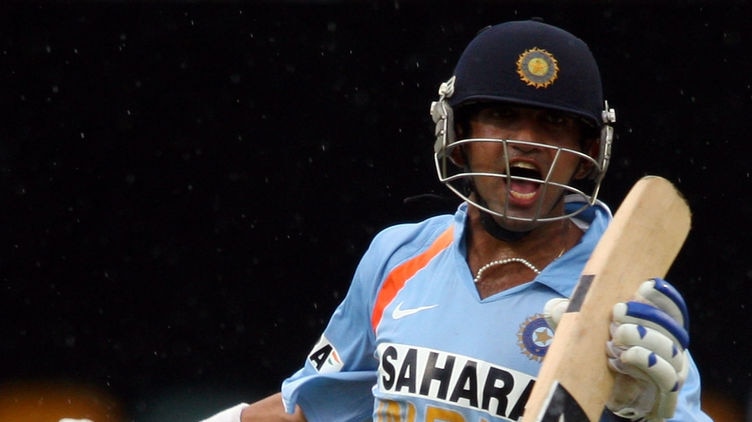 Gautam Gambhir of India celebrates scoring a century against Sri Lanka