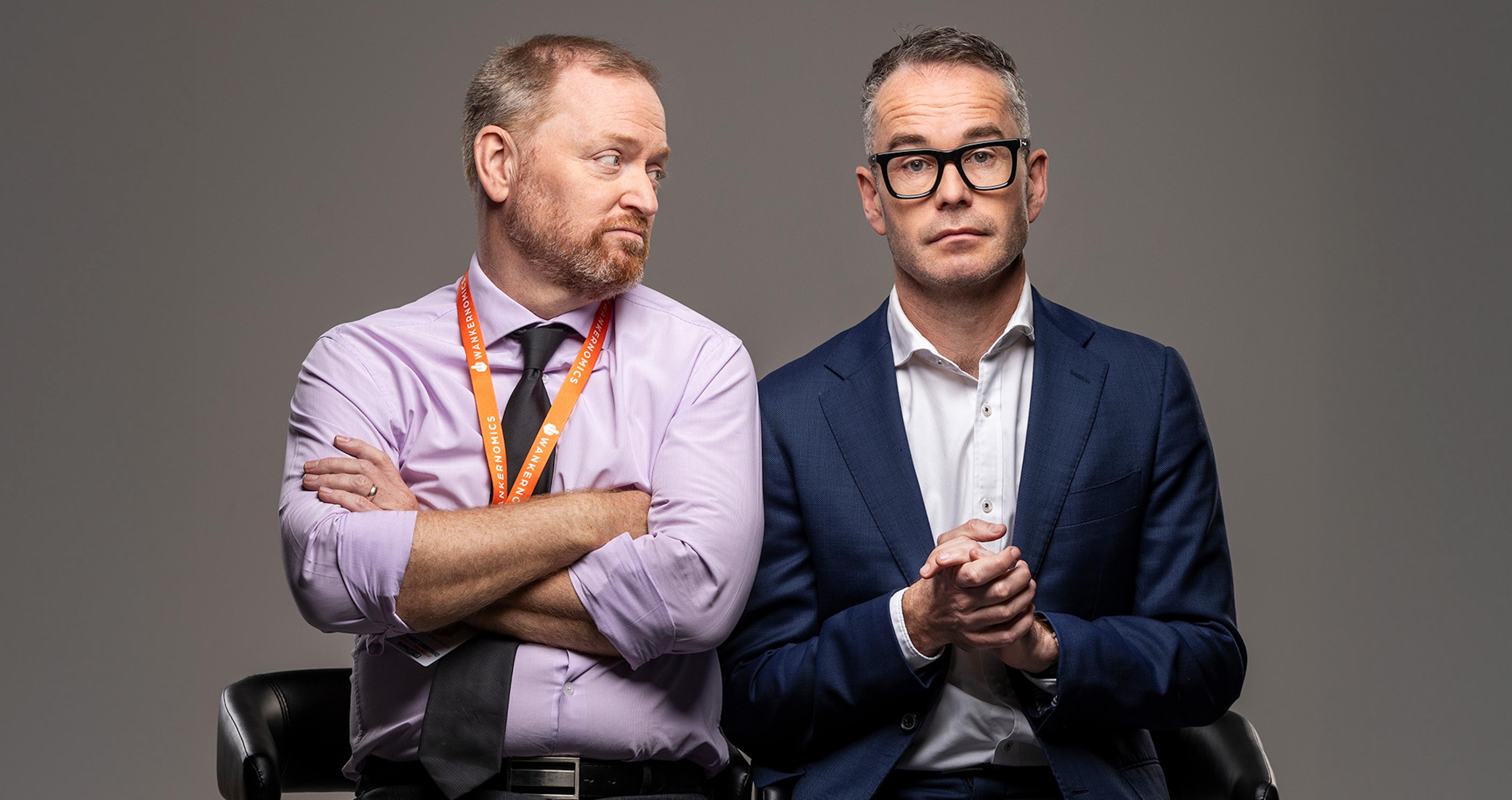 Charles Firth looks at James Schloeffel as he prepares to speak with his hands folded in front of me