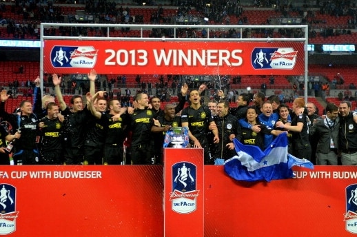 Wigan players celebrate winning the FA Cup