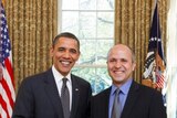 Louie Eroglu with US president Barack Obama after winning the video photographer of the year award.