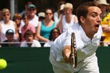 Serbian tennis player Viktor Troicki in action during a doubles match at Wimbledon in 2008.