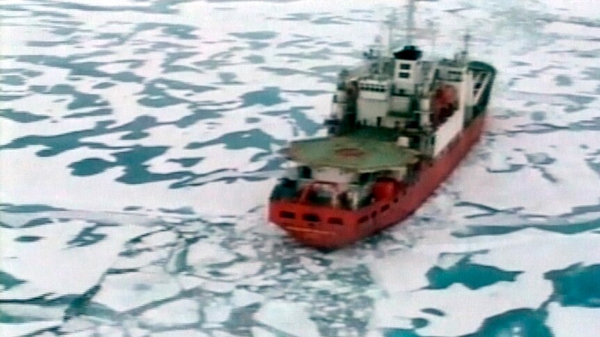 Ship plows through ice in Arctic ocean
