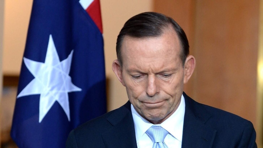 A sombre Tony Abbott after speaking about the shooting down of MH17