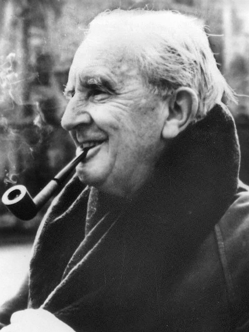 British author J R R Tolkien smoking a pipe