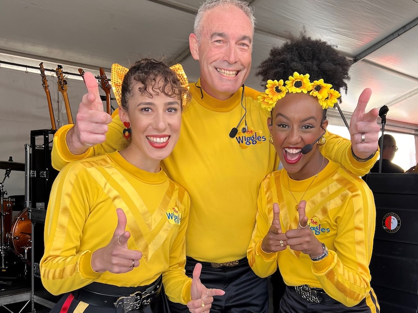 Three members of The Wiggles in yellow skivvies.