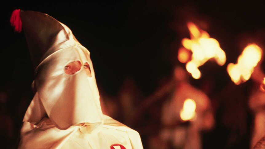 A member of the Ku Klux Klan is pictured at a rally in Maryland.