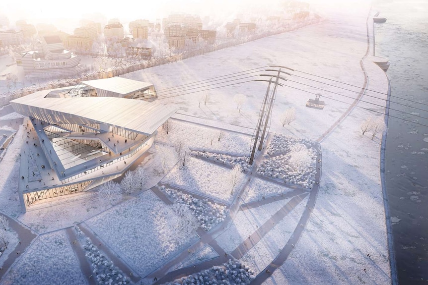 A view from above of a modern cable car terminal in Blagoveshchensk in Russia. The wintry landscape is covered in snow.