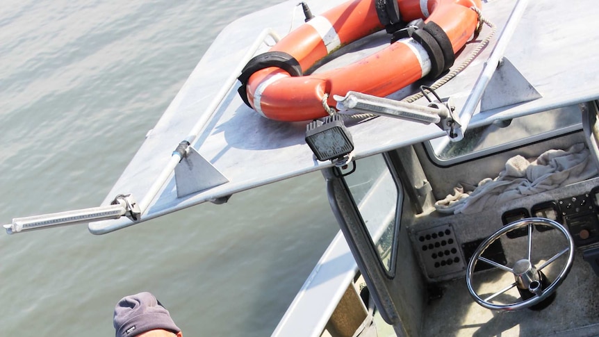 Corner Inlet fisherman Neville Clark on his boat.