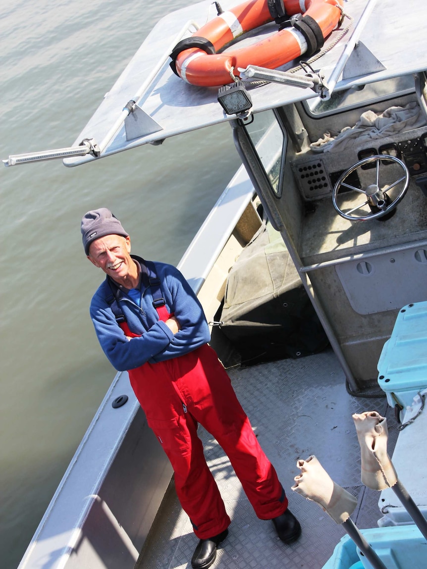 Corner Inlet fisherman Neville Clark on his boat.