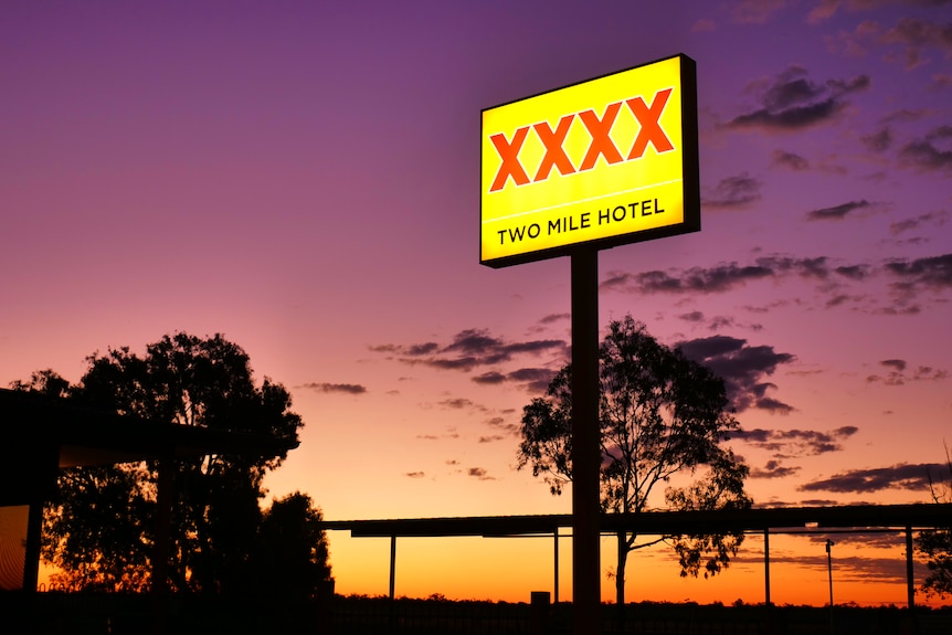 A beer sign with XXXX on it