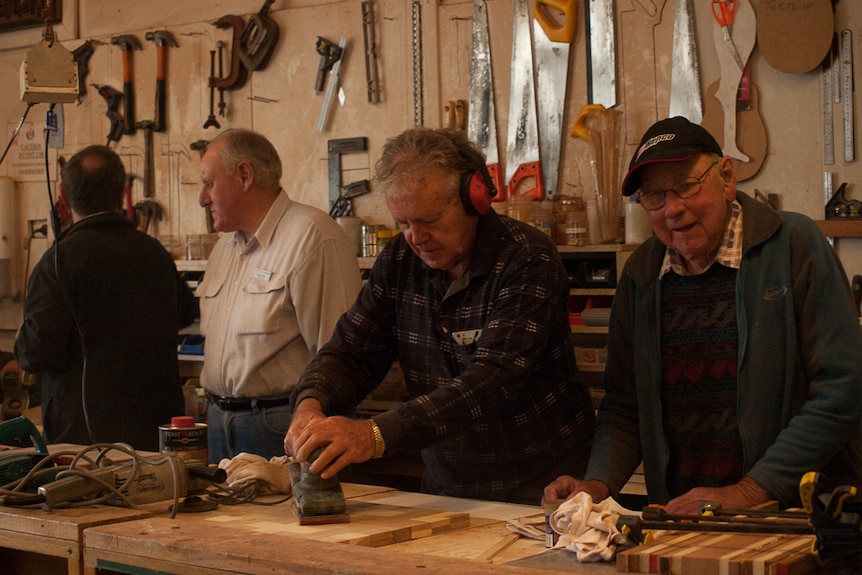 Jack Skuse (right) at the Camden Woodwork Shed with fellow volunteers.