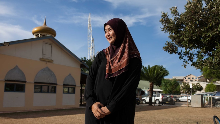 A Malay woman stands outside the Christmas Island mosque.
