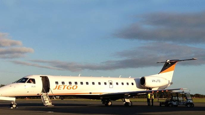 JetGo plane sits on tarmac.