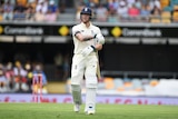 England batsman Ben Stokes leaves the field after his dismissal by Australian bowler Pat Cummins