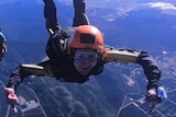 A young man skydiving