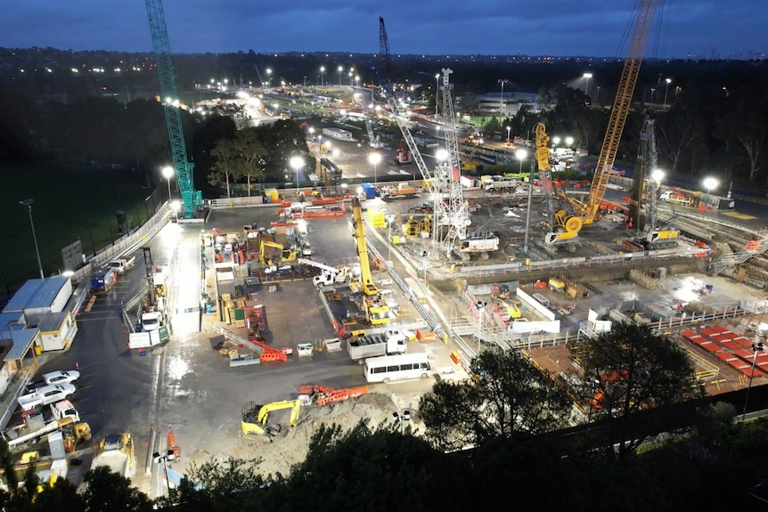 A construction site of North East Link at night.