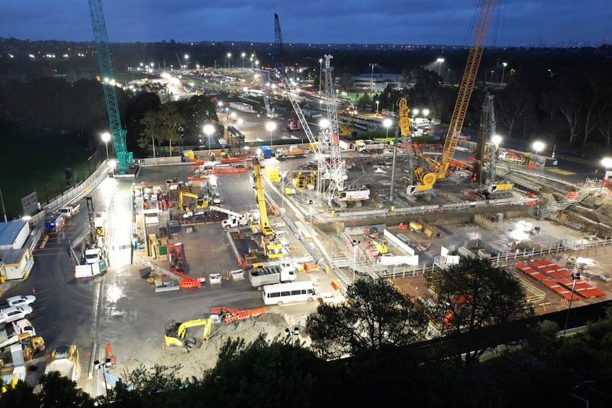 A construction site of North East Link at night.