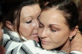 Schapelle Corby receives a kiss from her mother Rosleigh Rose after being found guilty