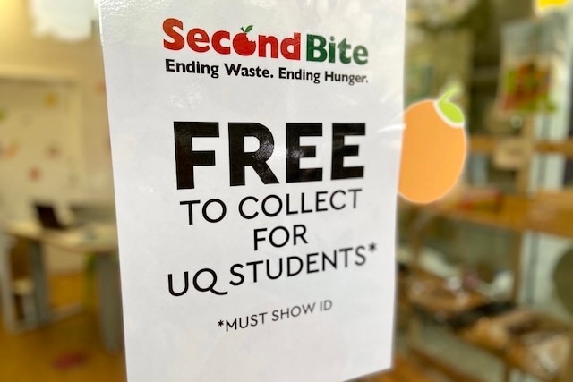 a sign says secondbite free to collect for uq students