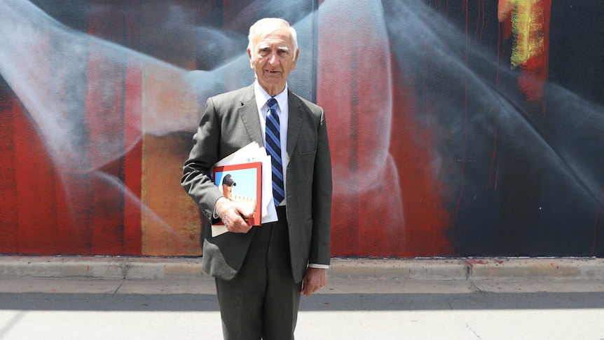 Uncle Alf (Boydie) Turner in front of the William Cooper mural in Shepparton