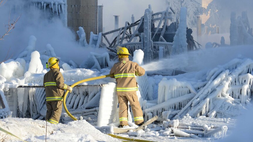Firefighters douse remains of Canadian nursing home