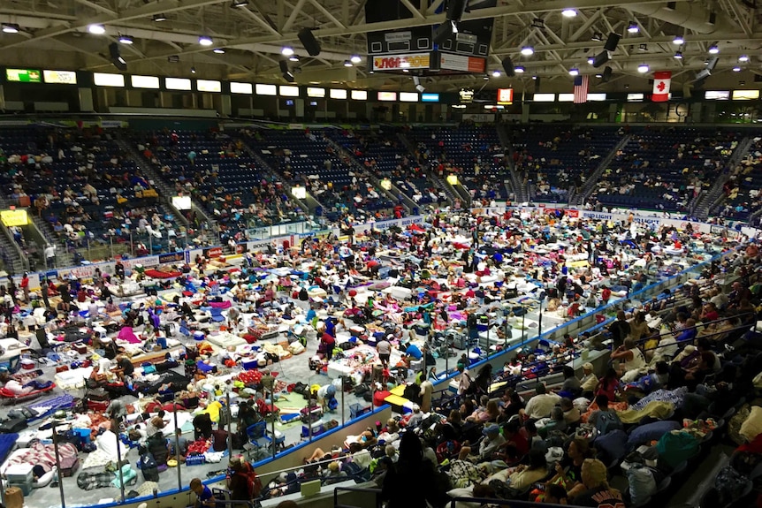 Evacuees fill Germain Arena, which is being used as a fallout shelter, in advance of Hurricane Irma.
