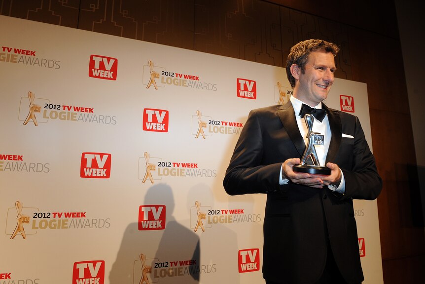Spicks And Specks presenter Adam Hills with his Silver Logie for Most Popular Presenter.