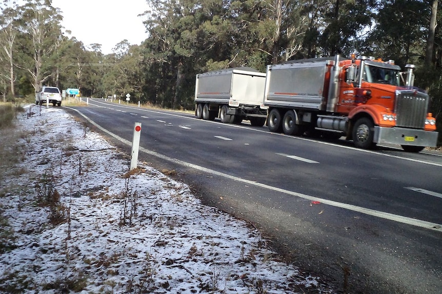 Snow on rural roadside