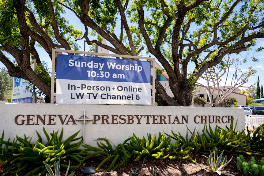 A sign from the Presbyterian Church of Geneva announces Sunday worship at 10:30 a.m.