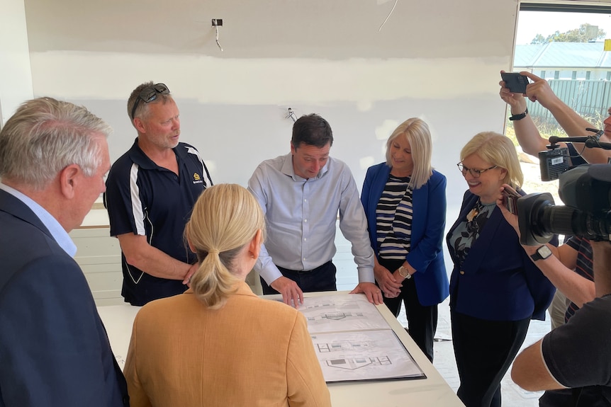 Matthew Guy overlooks house plans at a development in Shepparton.