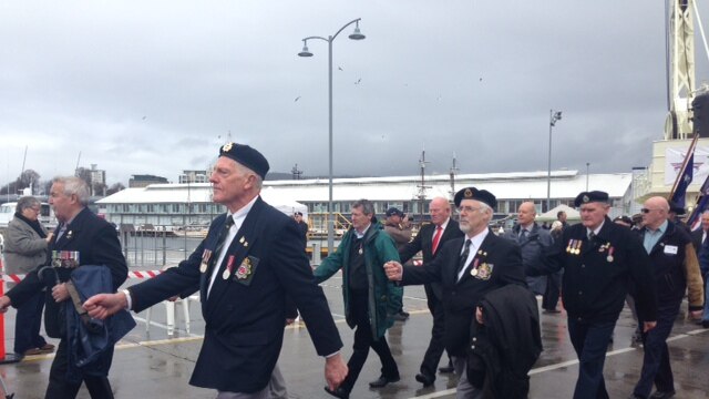 Veteran reservists on parade at Hobart's Franklin Wharf