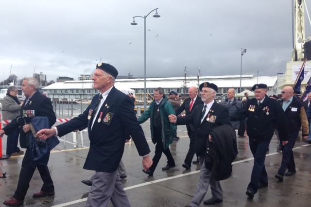 Veteran reservists on parade at Hobart's Franklin Wharf