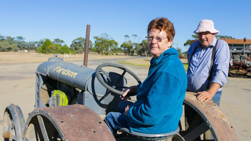 Warracknabeal's historical society secretary Leslie Steffen sits on one of the early Fordson Tractors