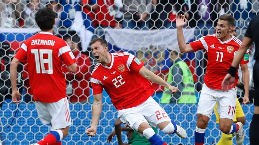 Artem Dzyuba celebrates Russia's third goal against Saudi Arabia
