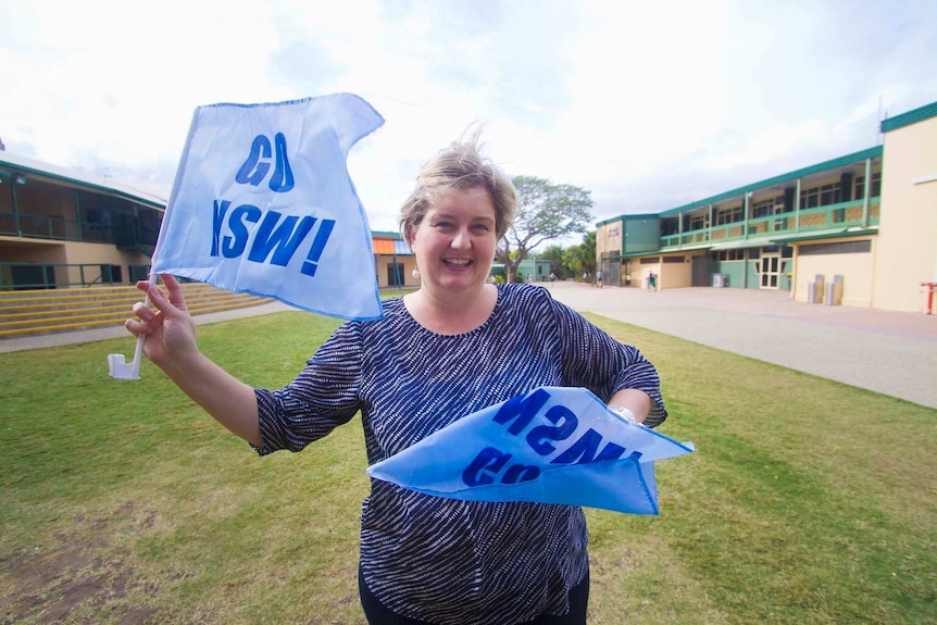Teacher Megan Grove moved to Queensland in 2008 but says she will never lose her Blues spirit.