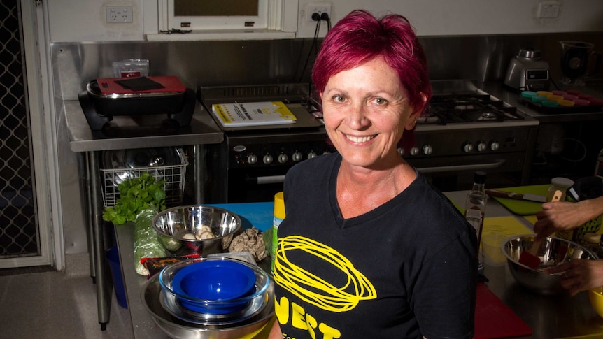 Lea Browning stands in a kitchen.