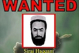 An undated wanted poster shows militant Siraj Haqqani.