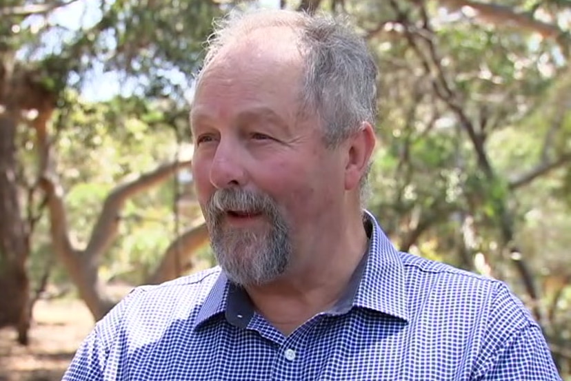 Trevor Thornton is interviewed in a bush setting.