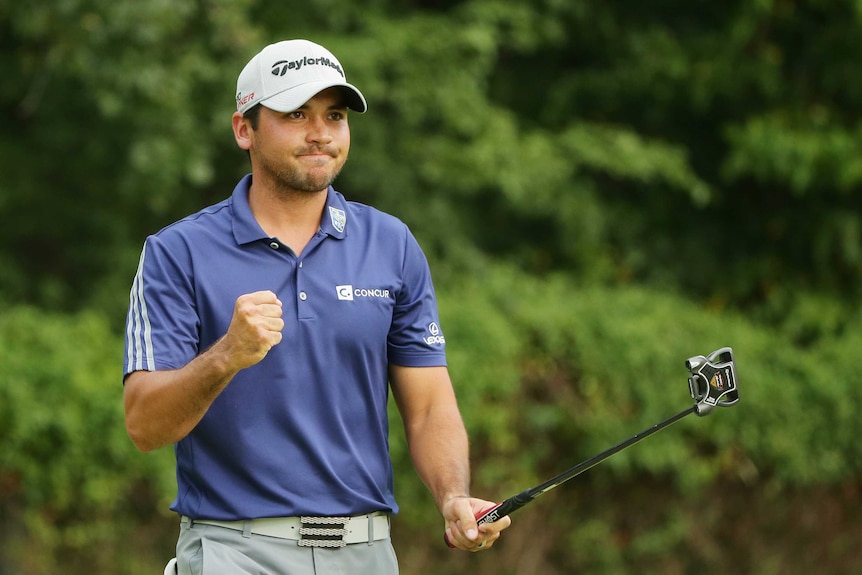 Australia's Jason Day celebrates a birdie putt in final round of the first PGA Tour play-off event.
