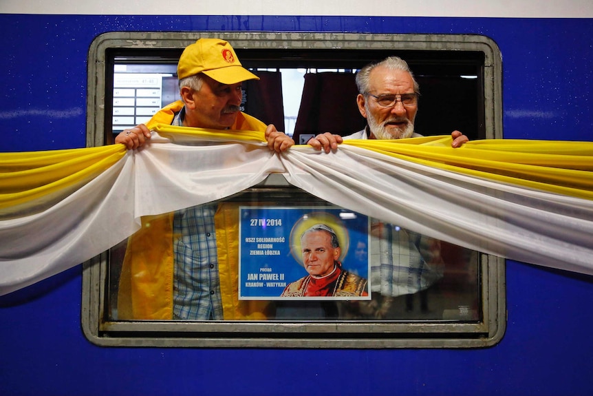 Polish pilgrims on train to Rome