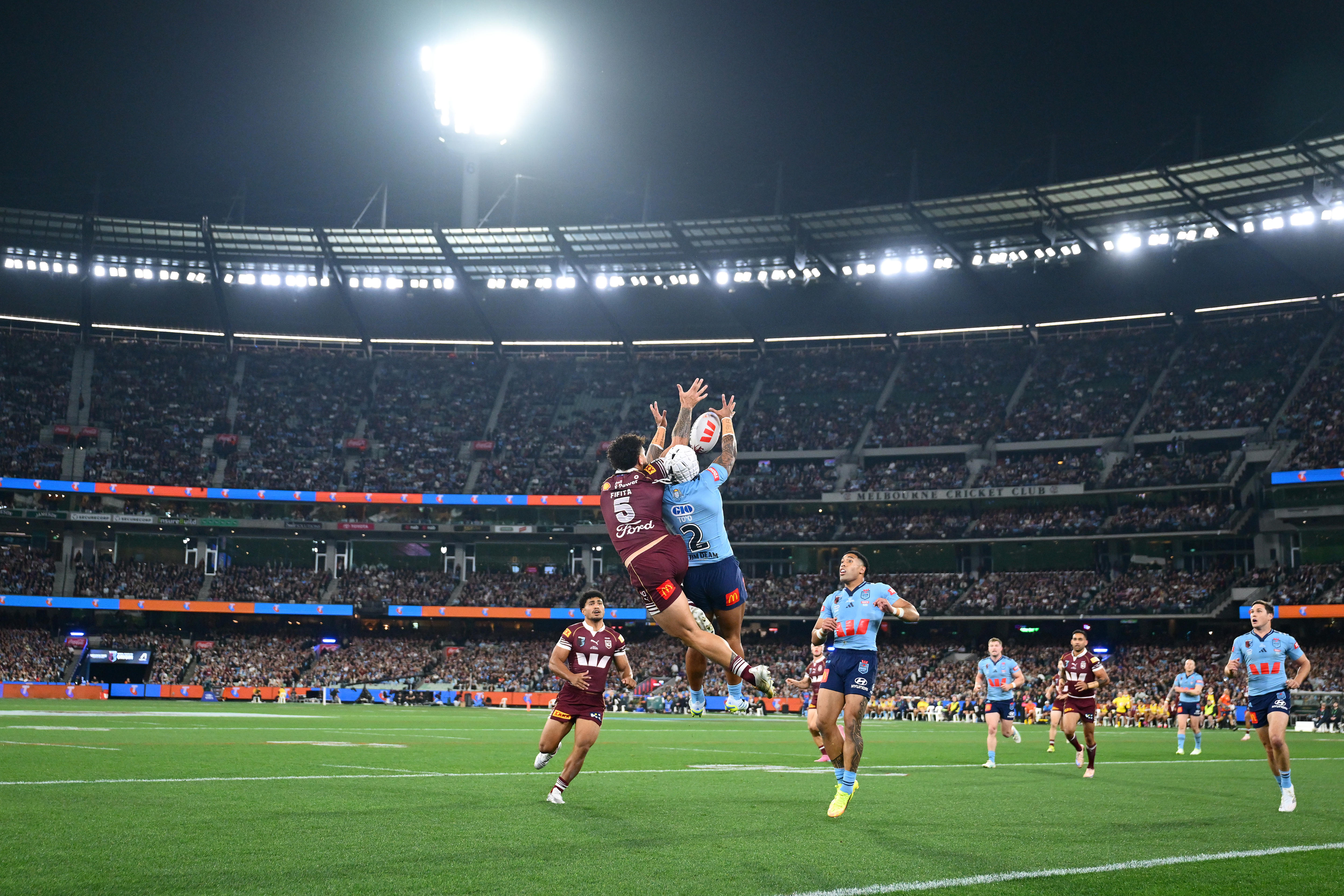 Jojo Fifita and Brian To'o in an aerial contest in State of Origin II.