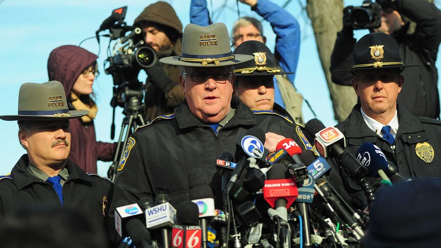 Connecticut police address the world's media