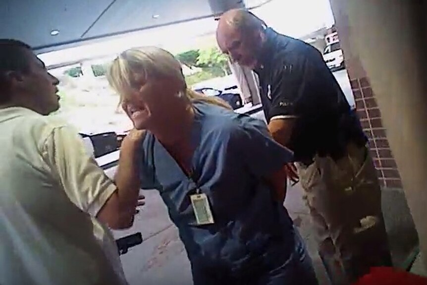 A screen grab shows a nurse being arrested.