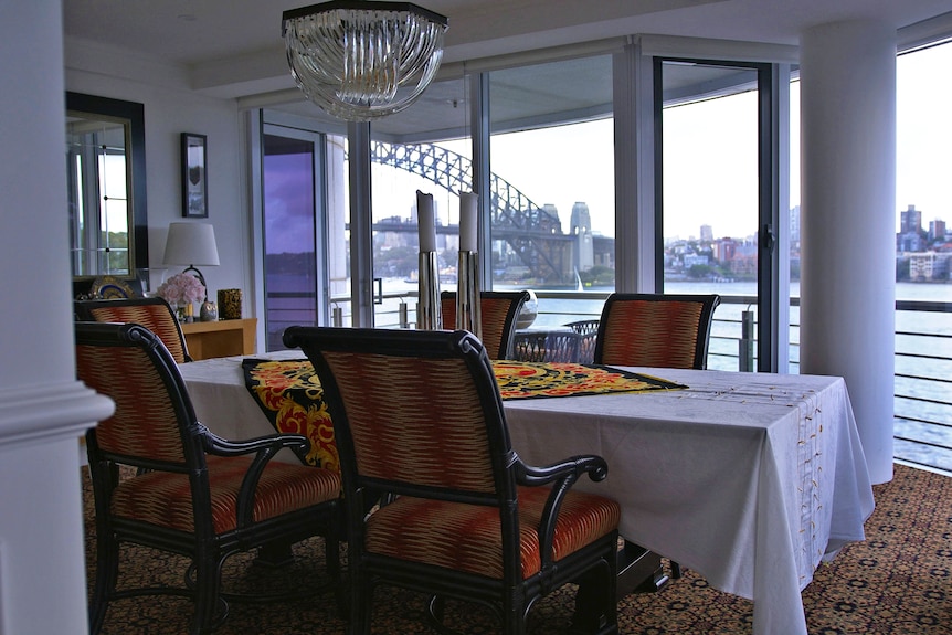 Alan Jones dining table, with Sydney Harbour Bridge in the background.