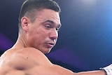 Tim Tszyu punches Bowyn Morgan, who covers his face with his gloves